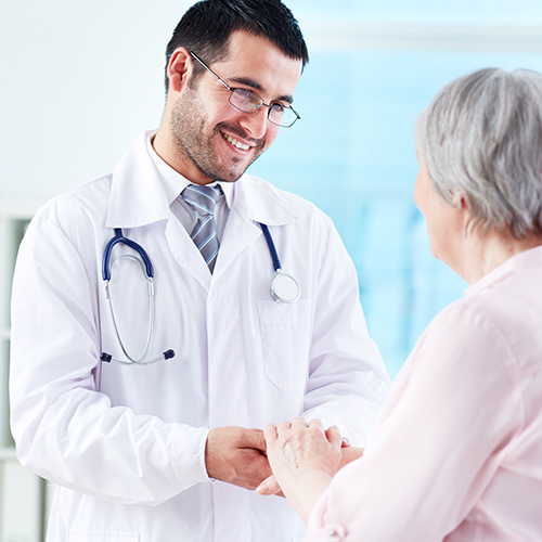 Doctor taking care of an elderly patient