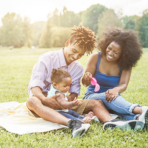 Happy family having a picnic in the sun